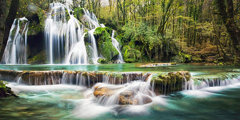 Pangea Images, Waterfall in a forest