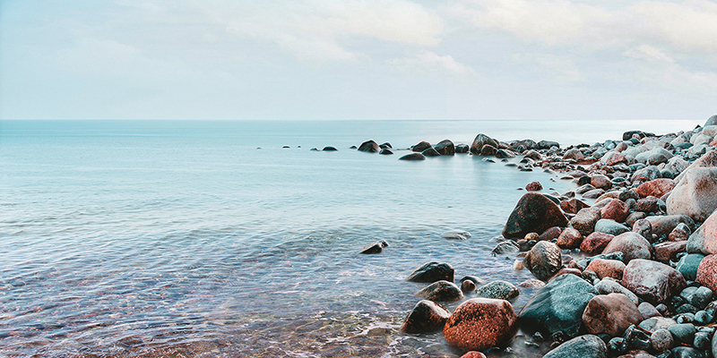 Pangea Images, Pebbles on the Beach