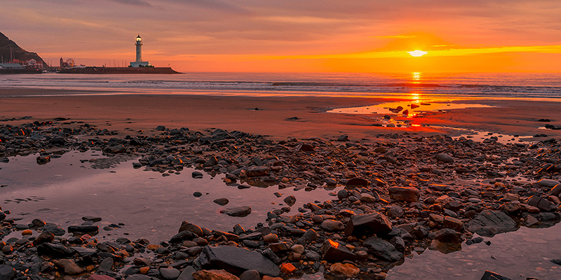 Pangea Images, Sunset on the Coast of Yorkshire, UK