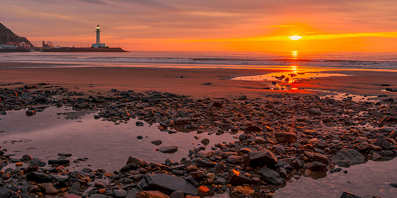 Pangea Images, Sunset on the Coast of Yorkshire, UK