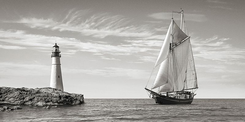 Pangea Images, Sailboat approaching Lighthouse, Mediterranean Sea (detail)