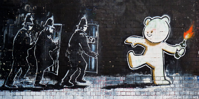 Anonymous (attributed to Banksy), Stokes Croft Road, Bristol (graffiti attributed to Banksy)