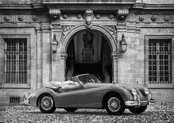 Gasoline Images, Luxury Car in front of Classic Palace (BW)