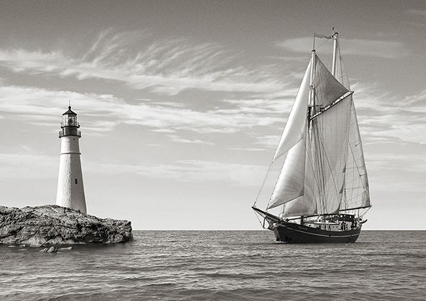 Pangea Images, Sailboat approaching Lighthouse, Mediterranean Sea