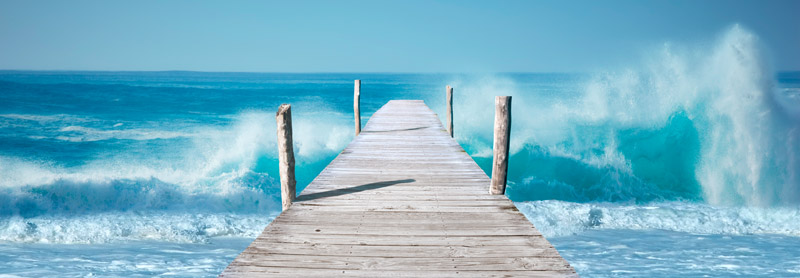 Pangea Images, Ocean Waves on a Jetty